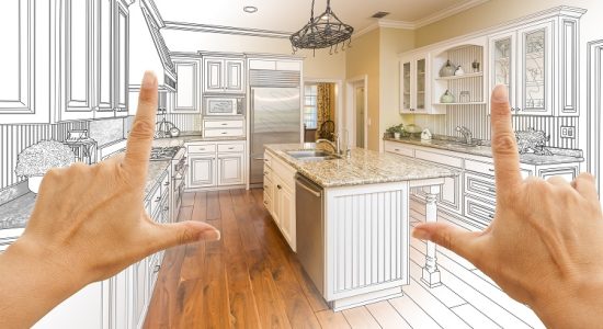 Female Hands Framing Gradated Custom Kitchen Design Drawing and Photo Combination.